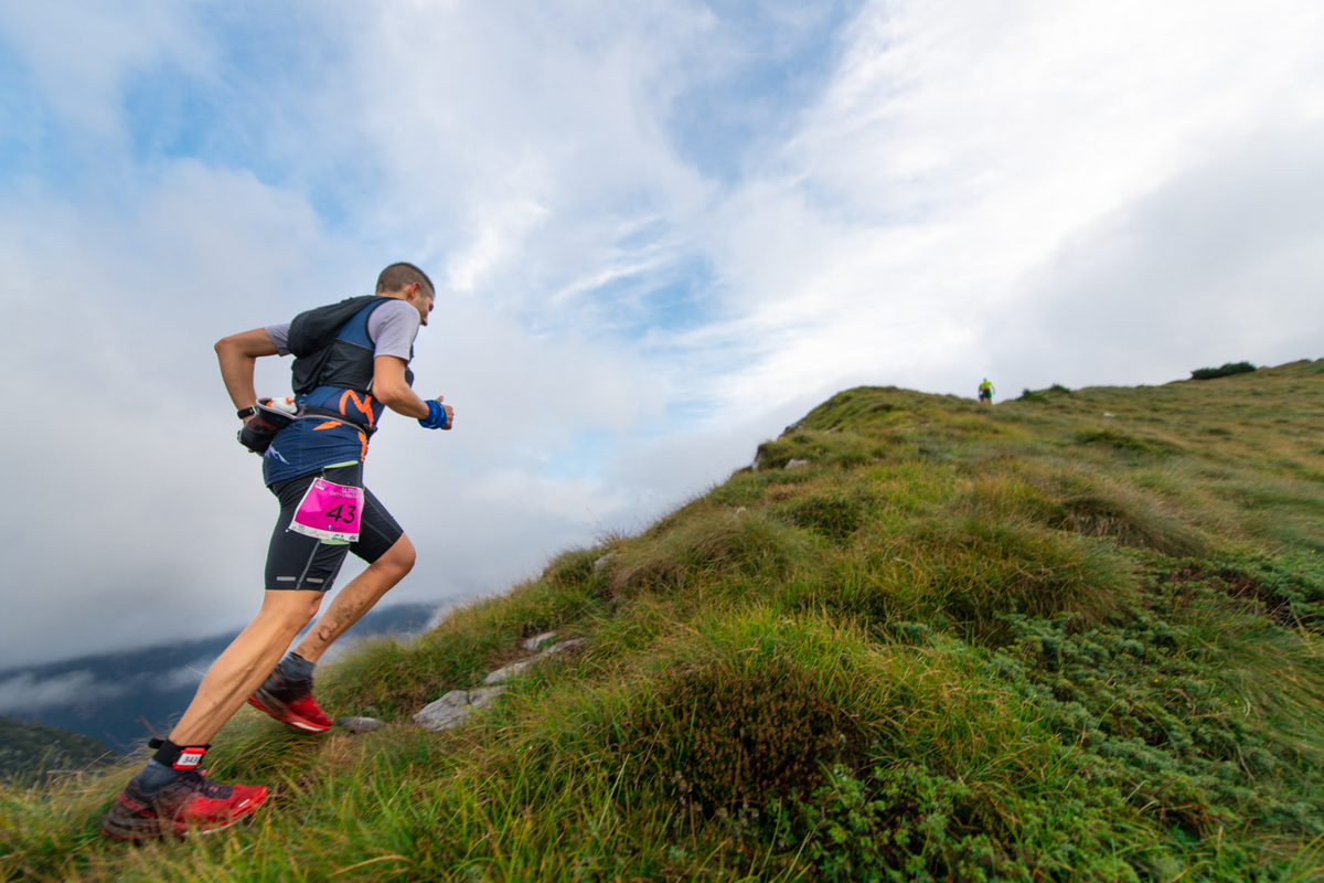 Man on a trail run.