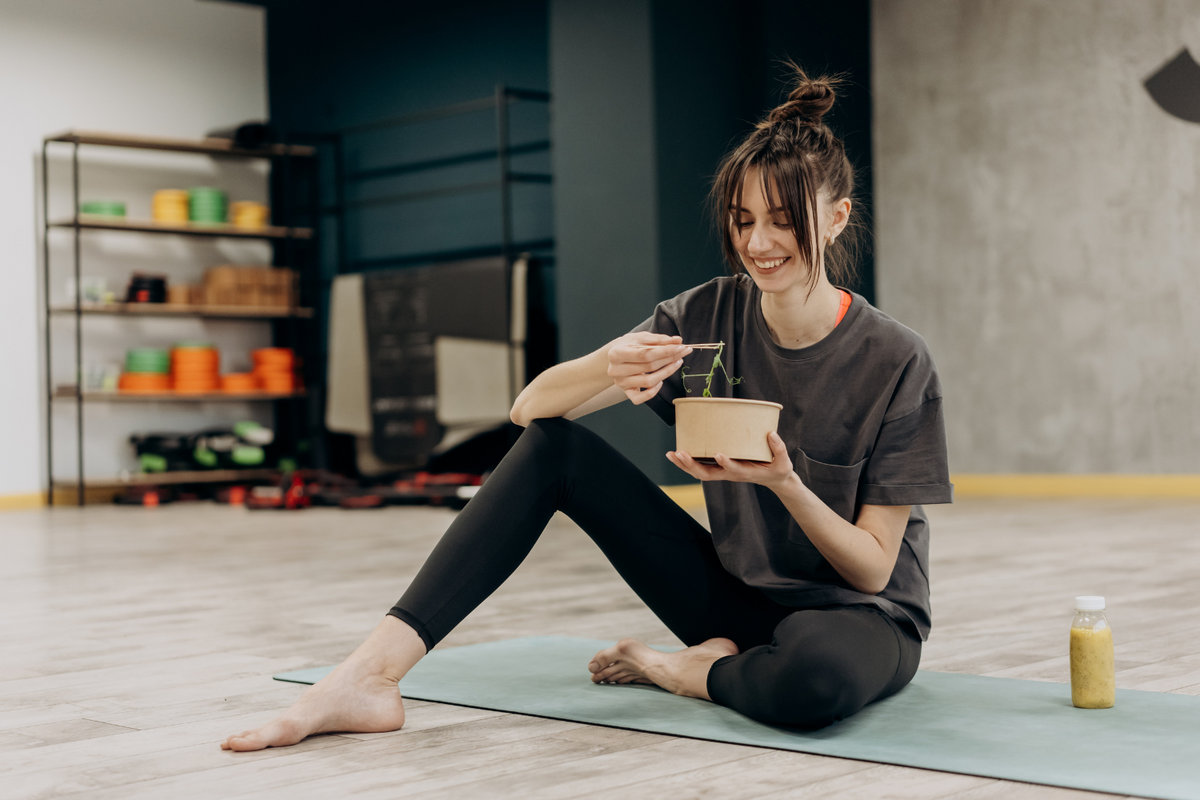 Person eating healthy after working out.