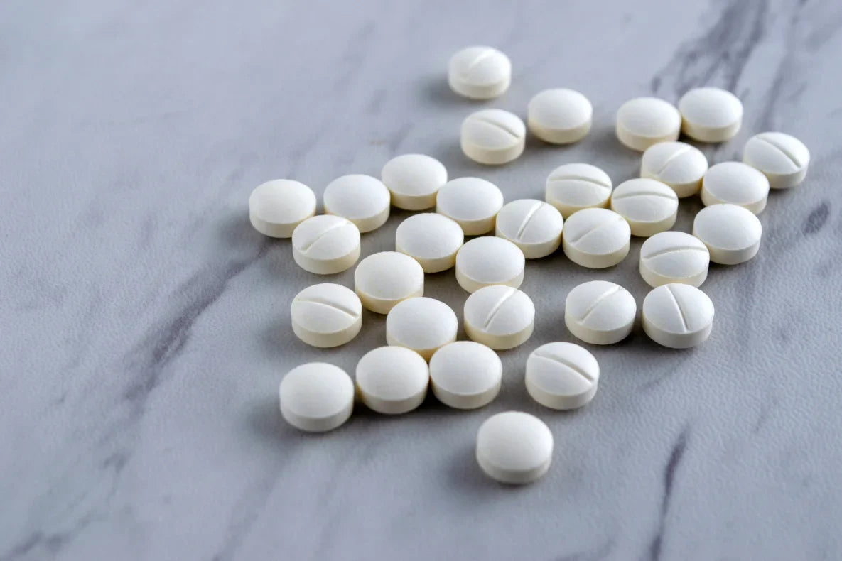 White tablets on the table.