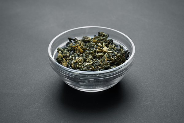 Bowl of dried tea leaves.