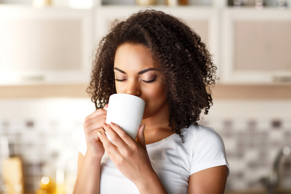 Woman drinking her tea.