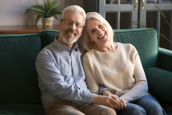 Elder couple looking happy and healthy.