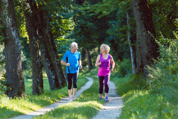 Elderly couple jogging.