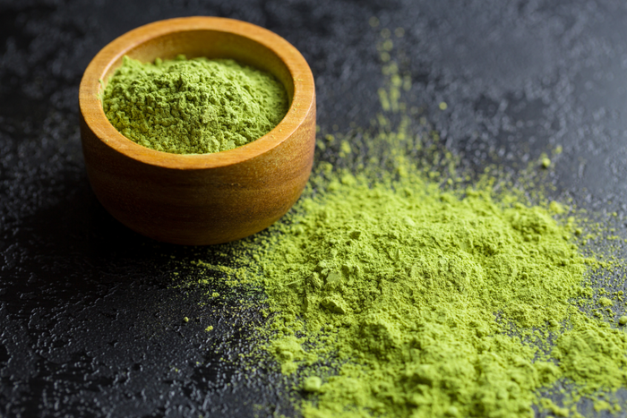Vibrant matcha green tea powder.