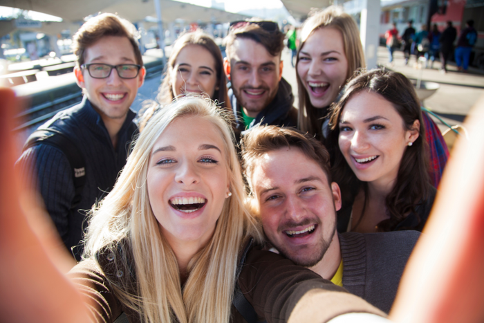 Group of happy friends taking a picture.