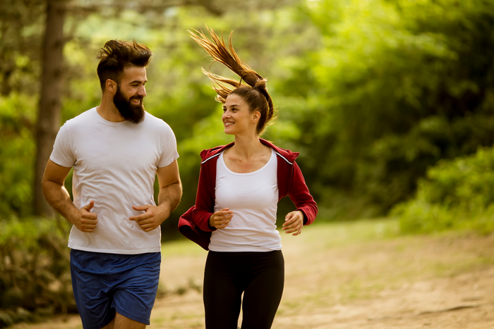 Man and woman on a run.
