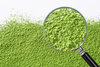 Matcha powder being inspected for sugar content
