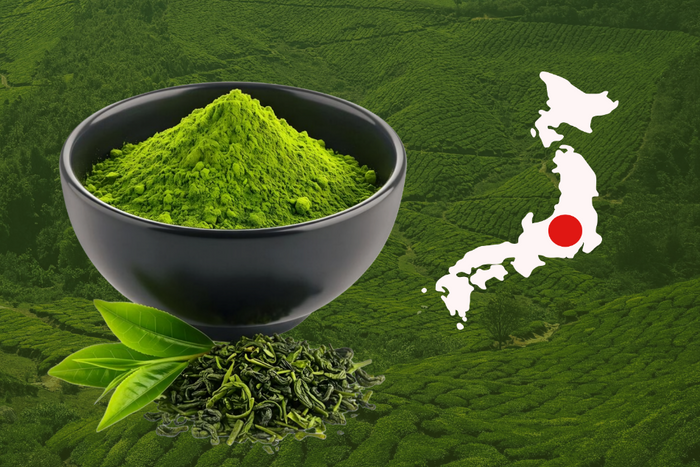 A bowl of matcha green tea beside the map of Japan