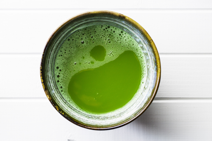 A cup of matcha tea.