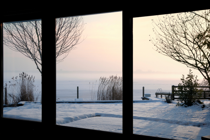 A window showing a snowy environment outside.