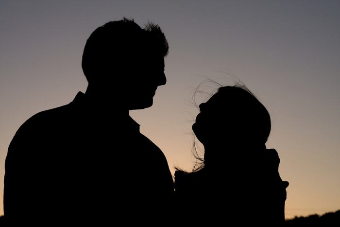 Silhoutte of man and woman.