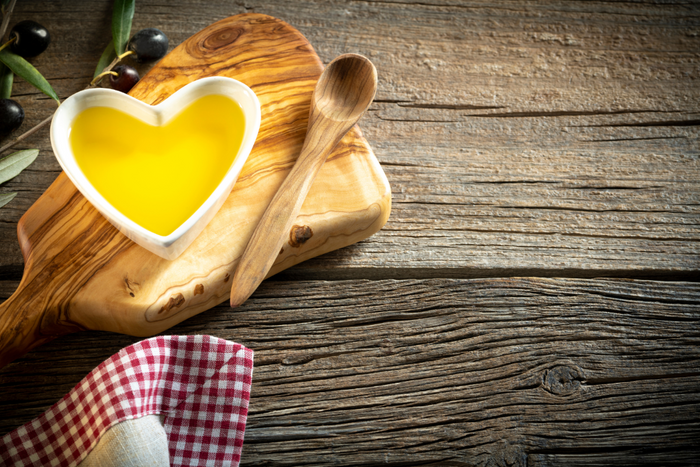 Olive oil on a heart-shaped bowl.
