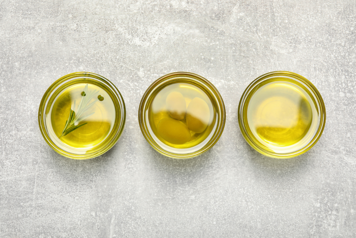 Three bowls of olive oil.