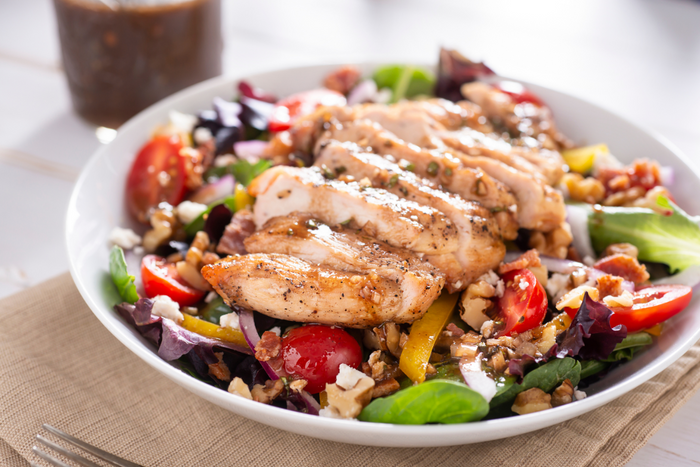 A grilled chicken salad.