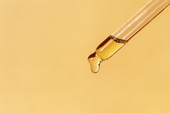 Oil droplet from tincture dropper.