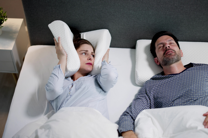 Woman can't sleep due to partner with sleep apnea.