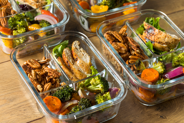 Containers filled with high-protein meals.