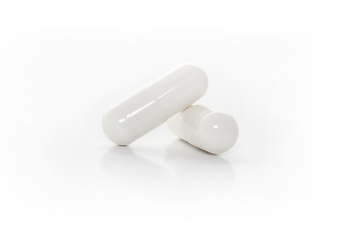 Two white capsules.